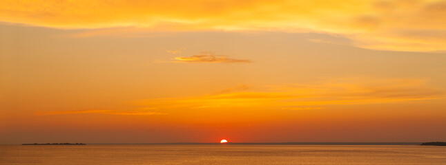 Leinwandbilder Honigfarbe Sunset. Red sky and ocean, beautiful orange landscape panorama skyline background  © millaf (Nemchinova)