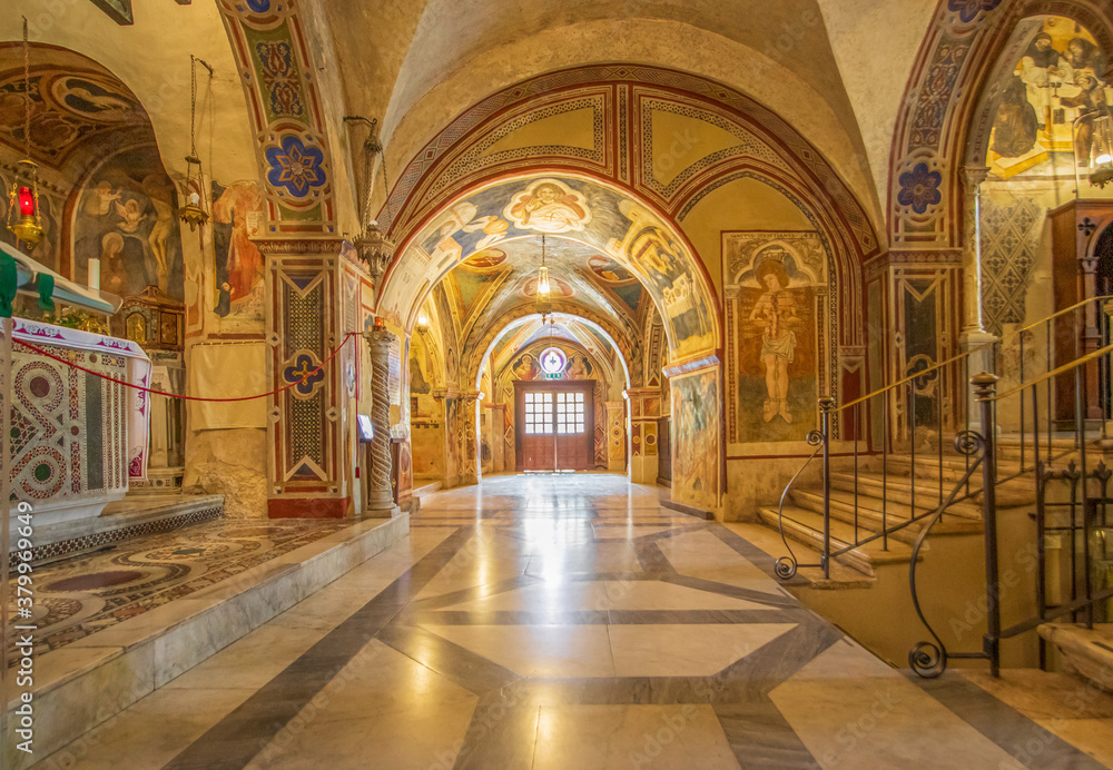 Subiaco, Italy - main sight of Subiaco and one of the most beautiful Benedictine monasteries in the World, the Sacro Speco Monastery displays amazing frescoes. Here in particular its interiors