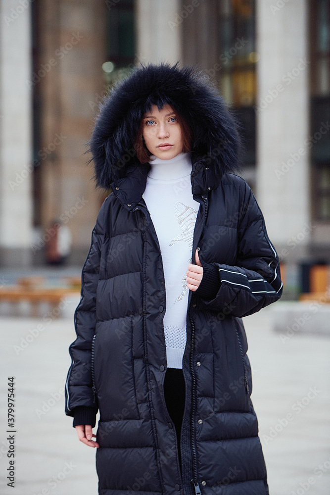 Fototapeta premium Young beautiful blonde model in fashionable clothes on the street. Street modern womens fashion