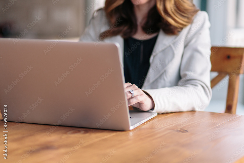 Beautiful woman working on a computer at home Beautiful woman working on a computer at home