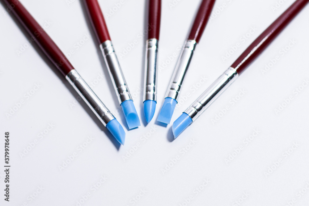 Brushes for artistic creation on a white background. The working ends are directed towards each other. Brushes for artistic creation on a white background. The working ends are directed towards each other.