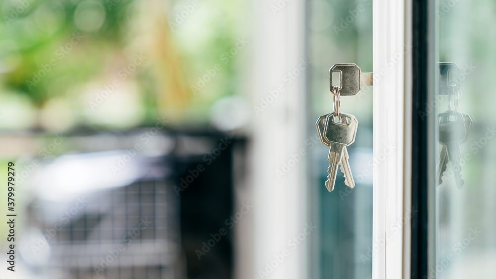 key in house door. Real estate agent offer house, property insurance and security, affordable housing concepts key in house door. Real estate agent offer house, property insurance and security, affordable housing concepts