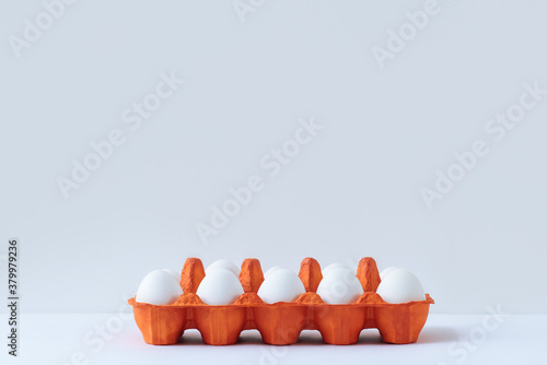 Eggs in orange case photo