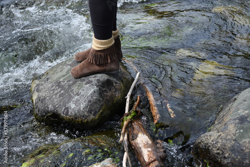 Girl Stands in Stream photo