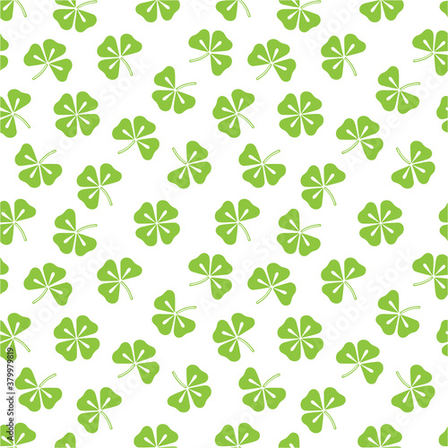 Seamless pattern with clovers. Vector hand drawn illustration. Illustration for wrapping paper, post cards, prints for clothes, and emblems.