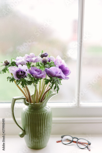 Wallpaper Mural A jug of anemone flowers on a window sill with a pair of glasses. Torontodigital.ca