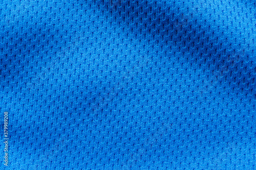 Blue sports clothing fabric football shirt jersey texture close up © Piman Khrutmuang