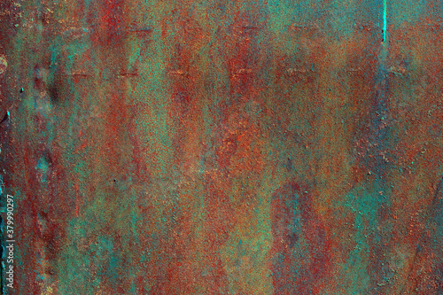 Rusty old painted metal background.