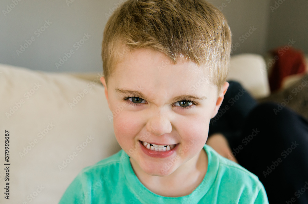 an incredibly sweet boy shows his tough-guy face an incredibly sweet boy shows his tough-guy face