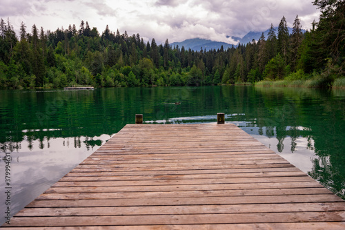 wooden pier in lake in Switzerland