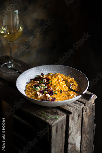 Photos Pumpkin risotto with hazelnuts and cranberries
