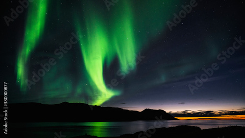 aurora borealis over the sea © pfless