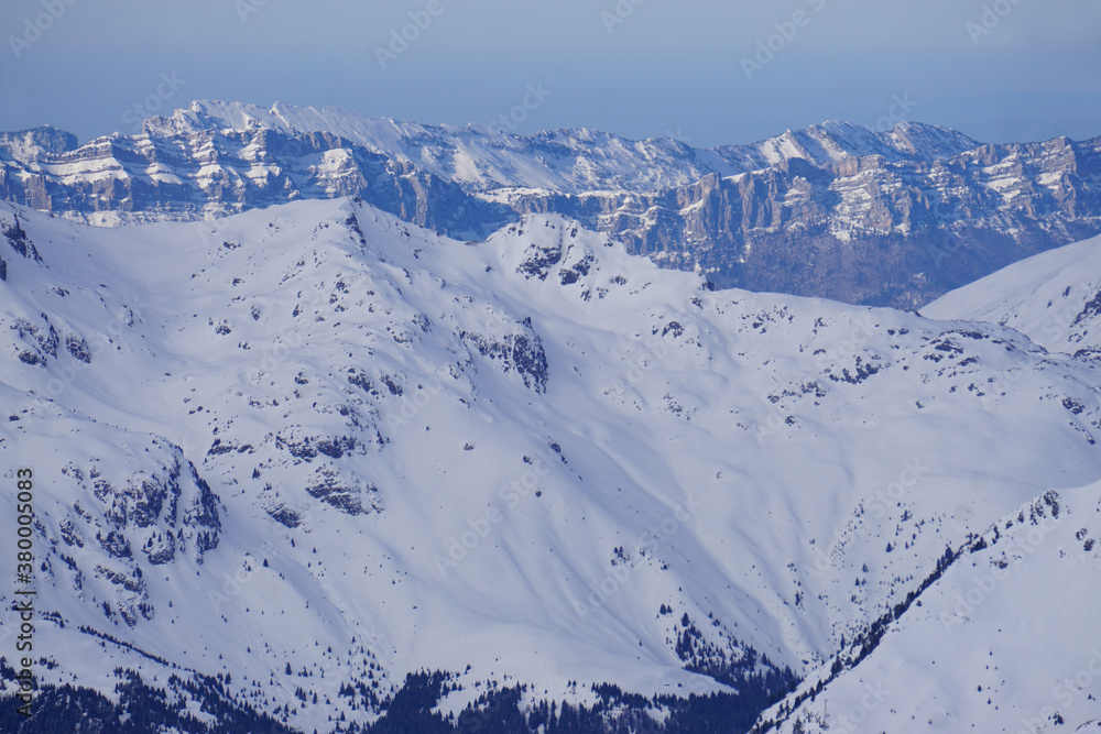 snow covered mountains in winter in the French Alps