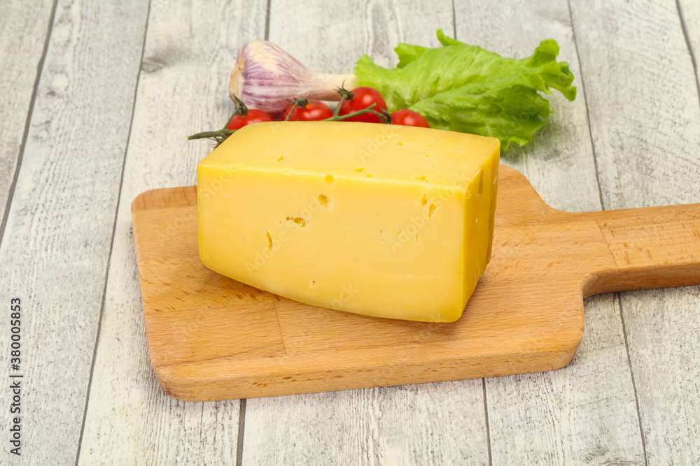 Hard yellow tasty cheese brick Hard yellow tasty cheese brick