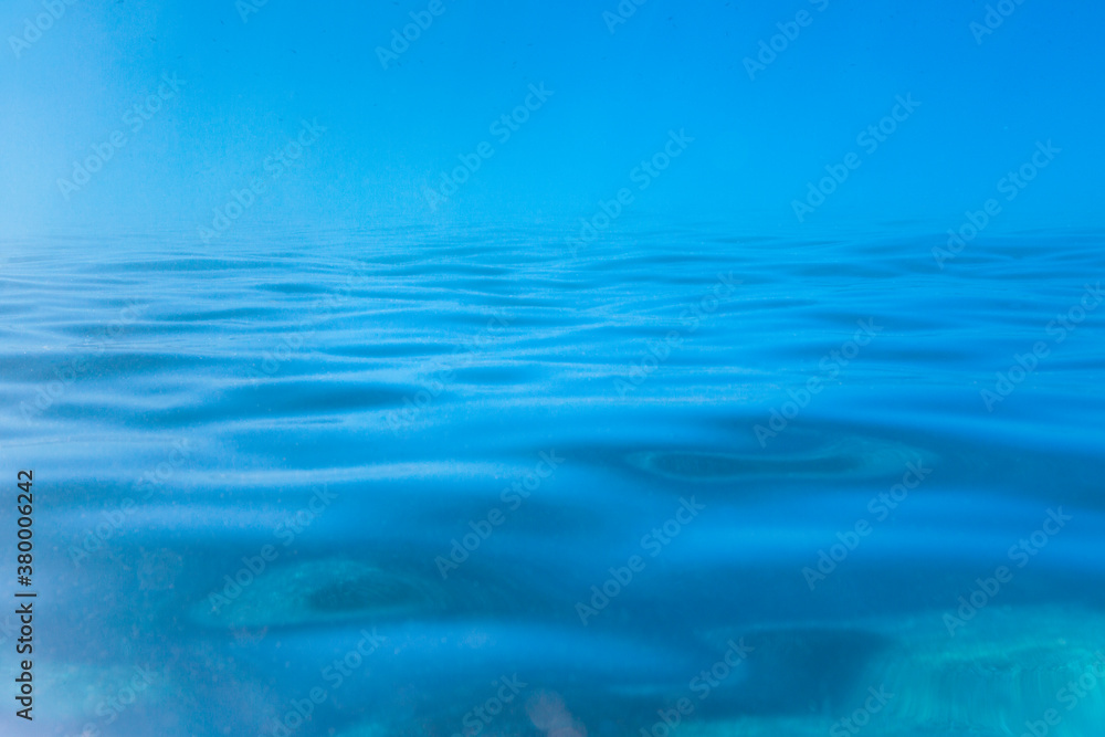 Rippled water surface seen from below Rippled water surface seen from below