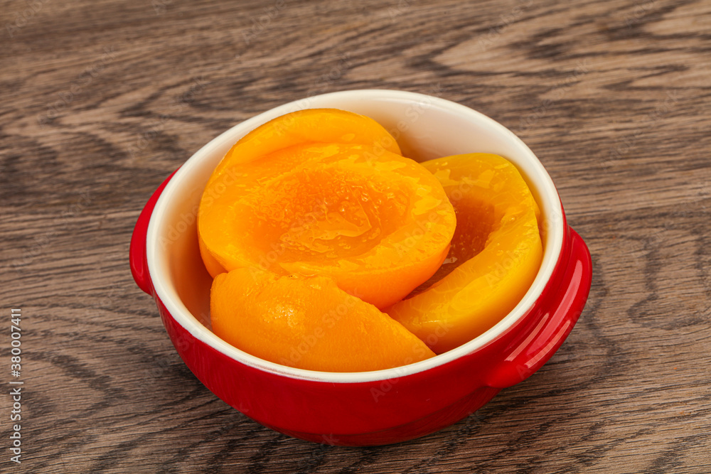 Marinated peaches fruit in the bowl Marinated peaches fruit in the bowl