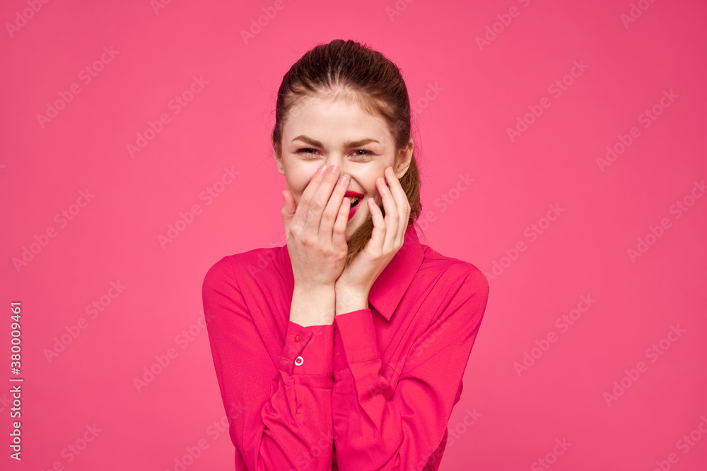 attractive girl in pink shirt cropped view bright makeup red lips gesturing with hands Copy Space attractive girl in pink shirt cropped view bright makeup red lips gesturing with hands Copy Space