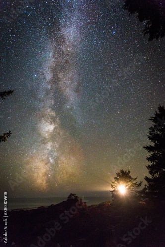 Lighthouse on the coast of Vancouver Island with the Milky Way rising above it photo