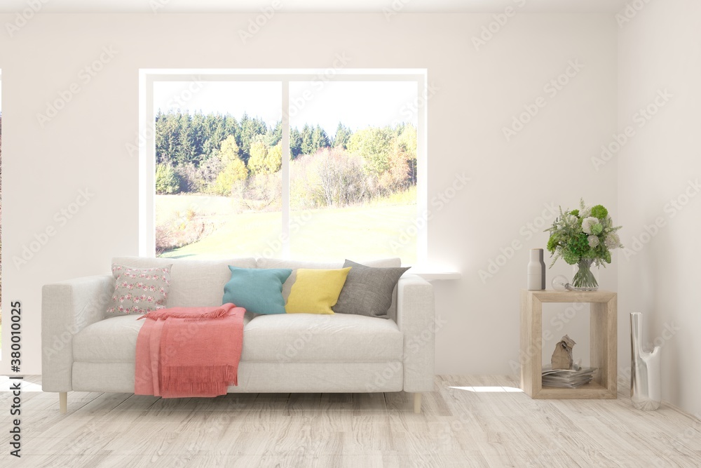 Fototapeta premium Stylish room in white color with sofa and autumn landscape in window. Scandinavian interior design. 3D illustration
