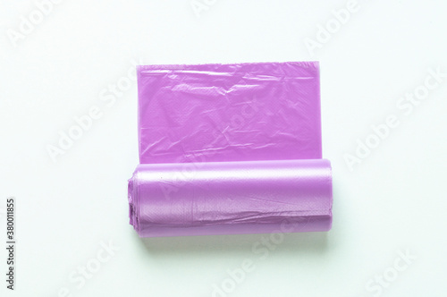 purple garbage bags on a white background