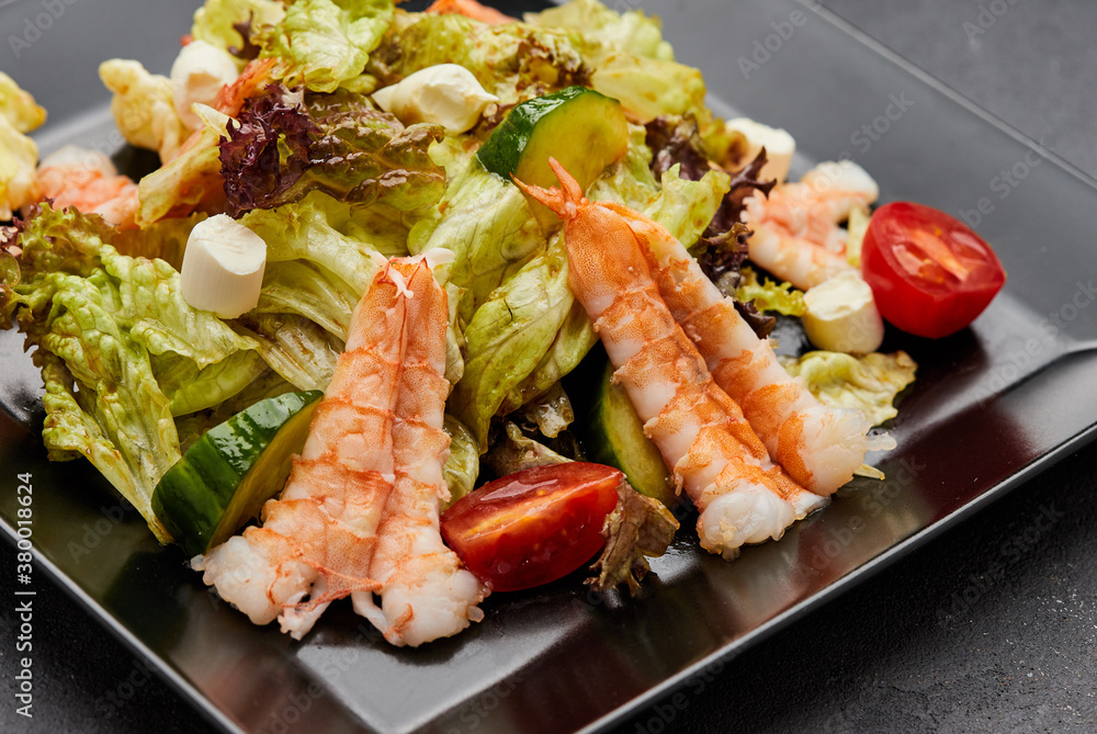 Fresh seafood salad served with prawns (shrimps ) Fresh seafood salad served with prawns (shrimps )