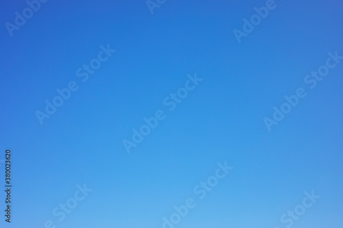 Clear blue sky background and empty space for your design, no cloud