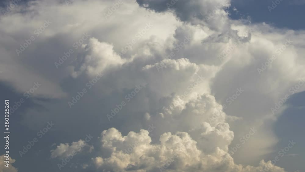 Cumulonimbus cloud on blue sky background, time lapse Cumulonimbus cloud on blue sky background, time lapse