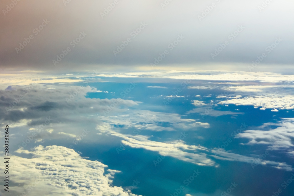 Aerial View of Clouds and the Ocean Below. Aerial View of Clouds and the Ocean Below.