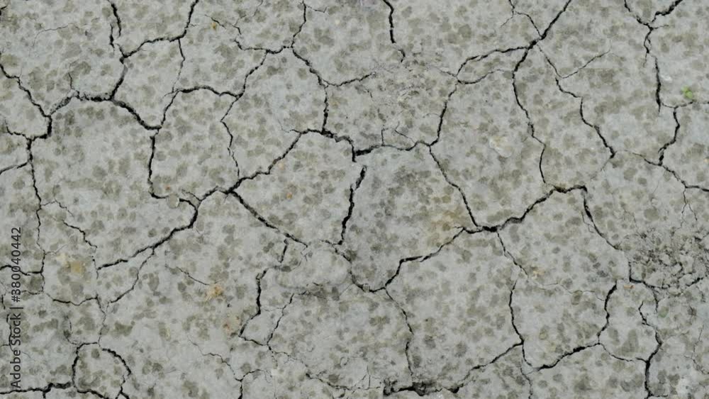 cracked surface soil from arid and dry , droplets rain falling drop on ground cracked surface soil from arid and dry , droplets rain falling drop on ground