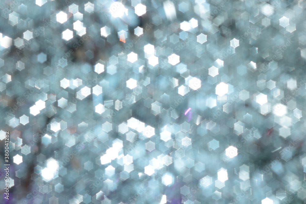 Obraz premium Christmas background and new year concept, abstract defocused light background with bokeh and blur, yellow. Winter banner , background image for overlay in the photo editor, out of focus
