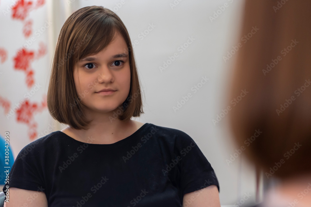 Portrait of young girl in hair salon Portrait of young girl in hair salon