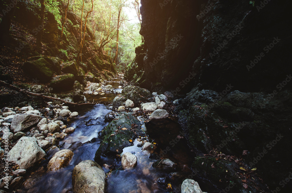 Morning light shining in narrow river valley Morning light shining in narrow river valley