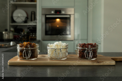 Dried fruits and fruit chips along with the fresh fruit of which they are made.