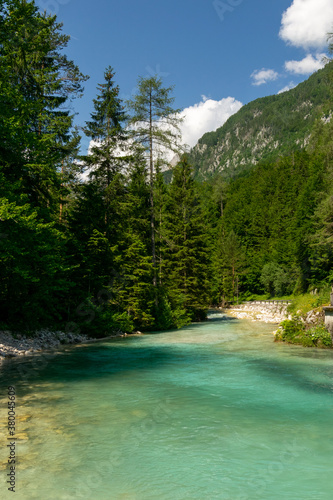 Triglavska Bistrica trail with beautiful, turquoise river and lush forests. © Izabela