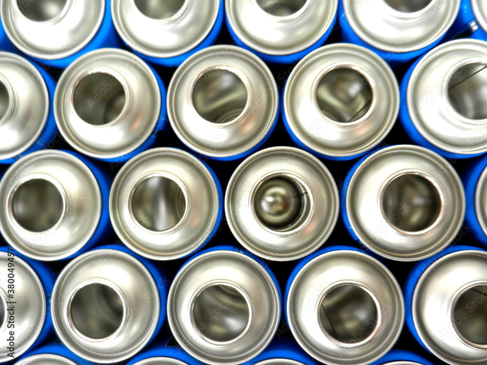 empty blue aerosol cans in factory empty blue aerosol cans in factory