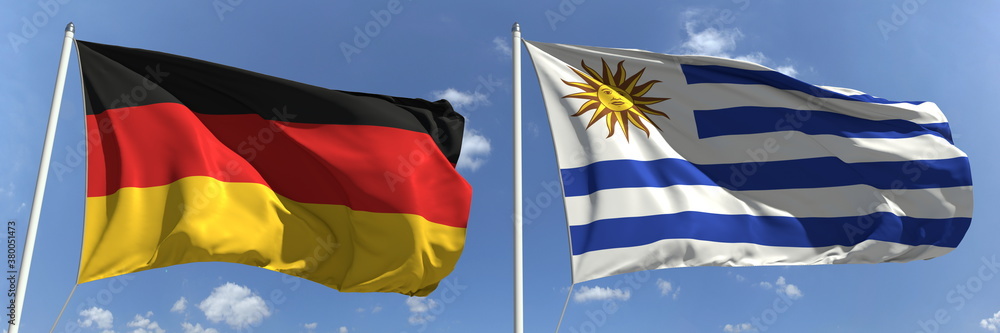 Flying flags of Germany and Uruguay on high flagpoles. 3d rendering Flying flags of Germany and Uruguay on high flagpoles. 3d rendering