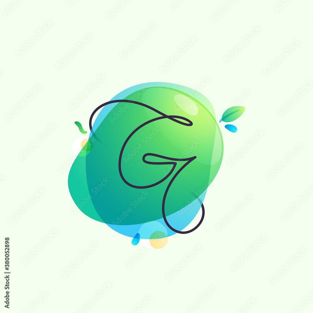 G letter logo placed on green watercolor blots. G letter logo placed on green watercolor blots.