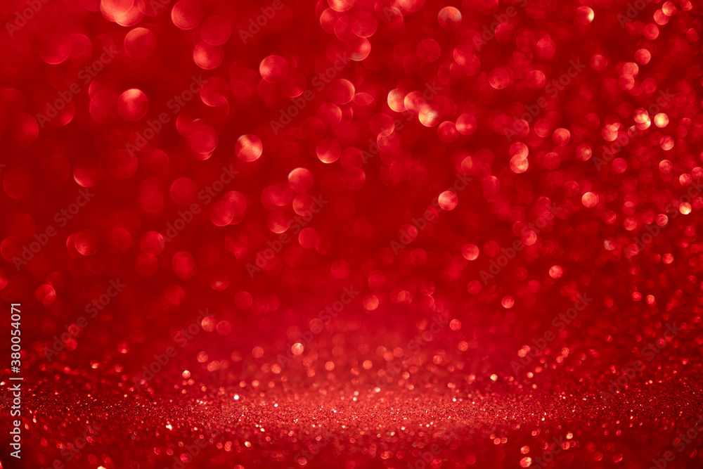 abstract red sparkling blurry background for Christmas or Valentine's day. Place to insert objects in the center. abstract red sparkling blurry background for Christmas or Valentine's day. Place to insert objects in the center.