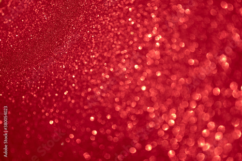 abstract glowing red background with sparks and defocus effect