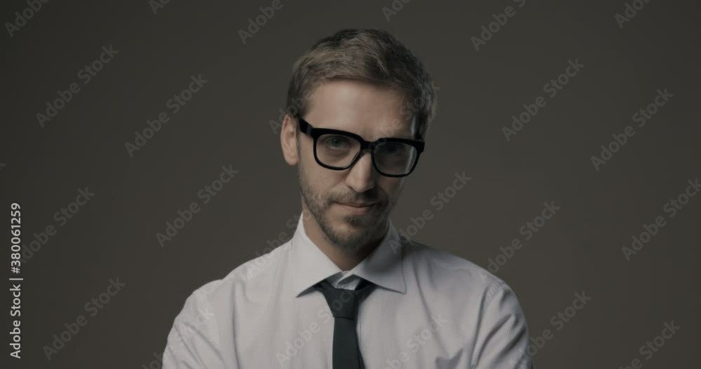 Young businessman smiling at camera Young businessman smiling at camera