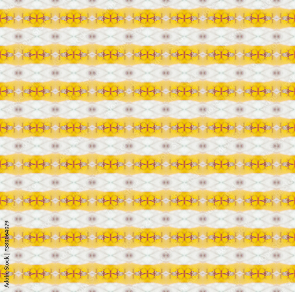 Yellow pattern repetition inside ancient kaleidoscope