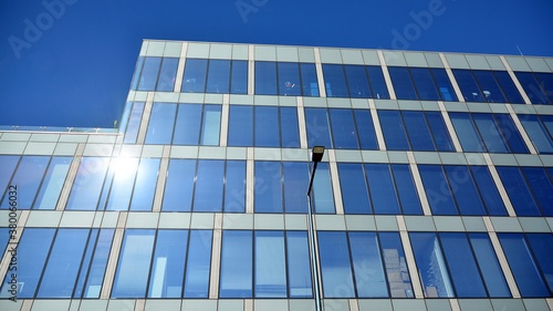 Modern building facade with reflections and colours.