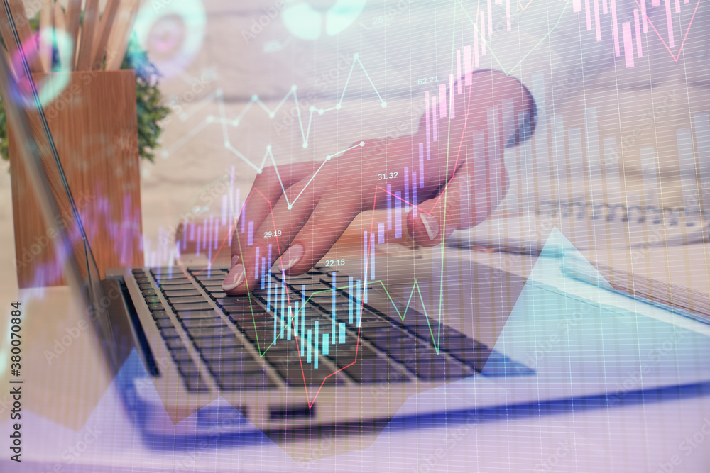 Multi exposure of woman hands typing on computer and forex chart hologram drawing. Stock market analysis concept. Multi exposure of woman hands typing on computer and forex chart hologram drawing. Stock market analysis concept.