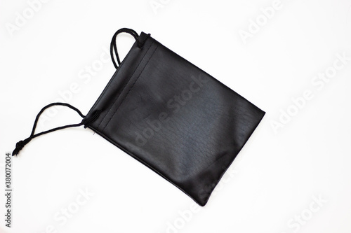 Black case. Small black pouch. Small bag. Clutch with black laces. Pouch and laces.