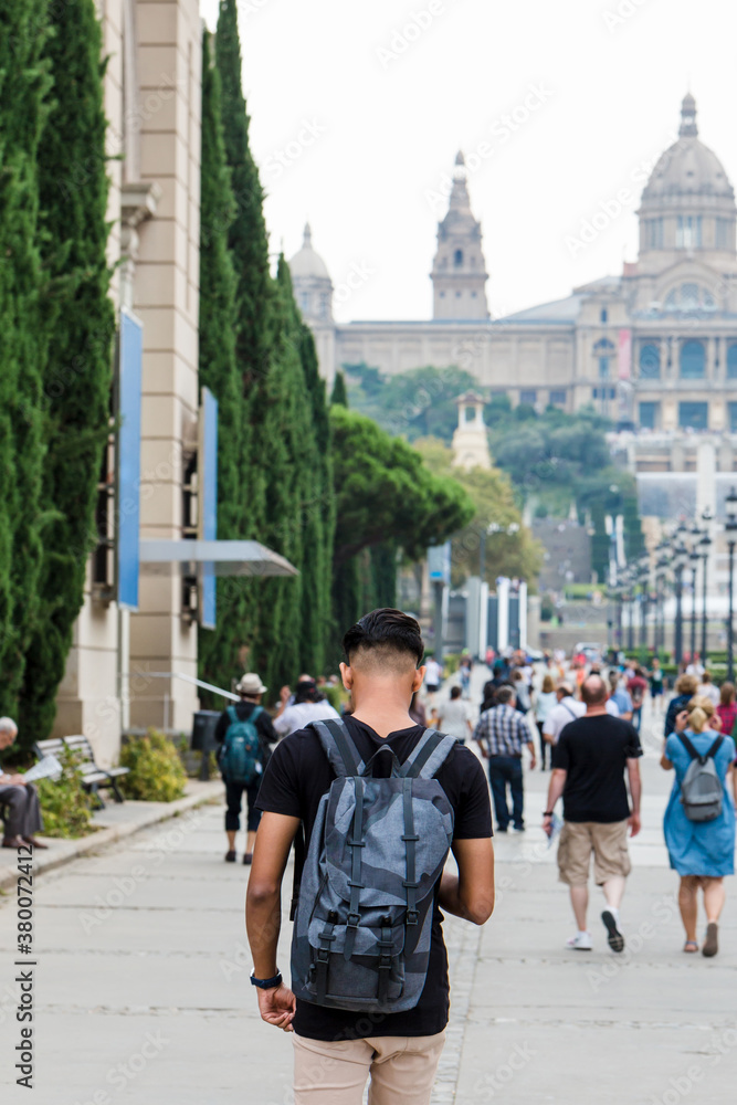 Man wandering and taking pictures in Barcelona Man wandering and taking pictures in Barcelona