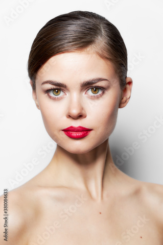 Beautiful woman nude shoulders red lips attractive look 