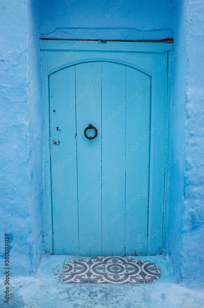 Blue door in Chefchaouen Blue door in Chefchaouen