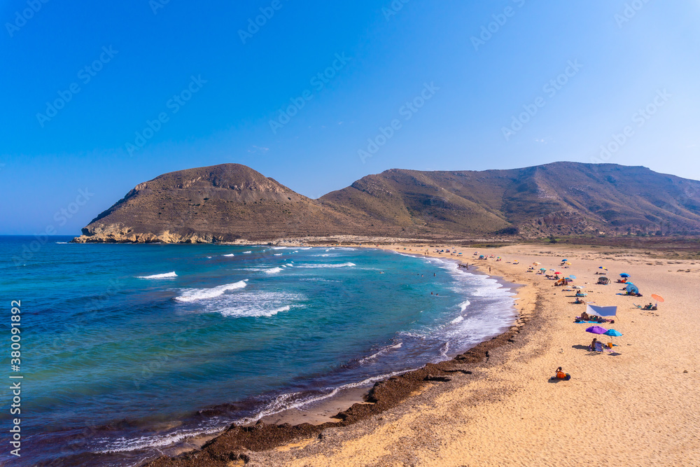 The beautiful beach in summer of Playazo de Rodalquilar in the natural park of Cabo de Gata, Nijar, Andalucia. Spain, Mediterranean Sea