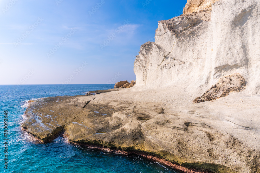 The gigantic white rock walls at Cala de Enmedio in the Cabo de Gata natural park, Nijar, Andalucia. Spain, Mediterranean Sea