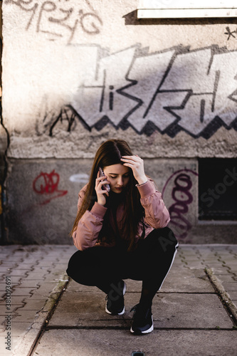 Young woman talking on the phone photo